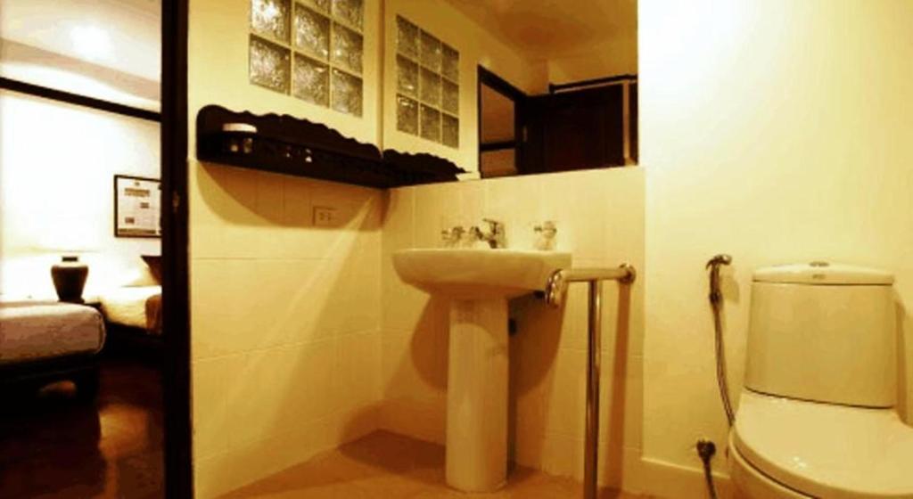 Cucumber Inn Suite Pattaya Chambre photo